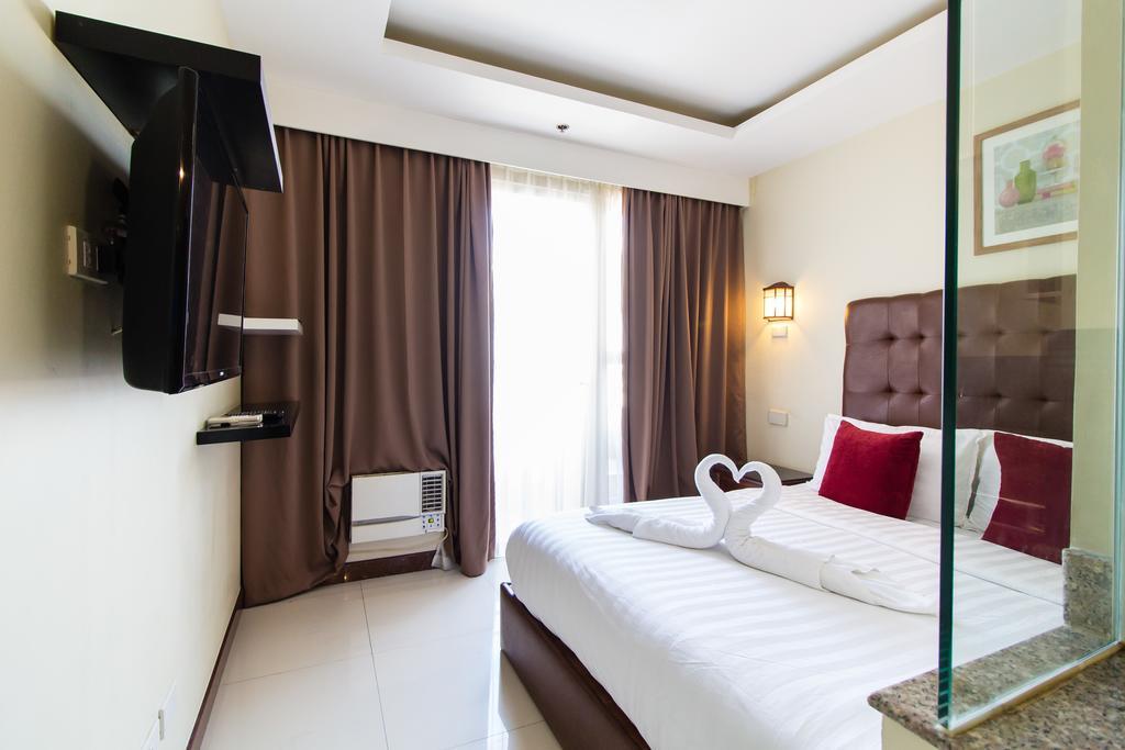 Jmm Apartment Suites Манила Экстерьер фото