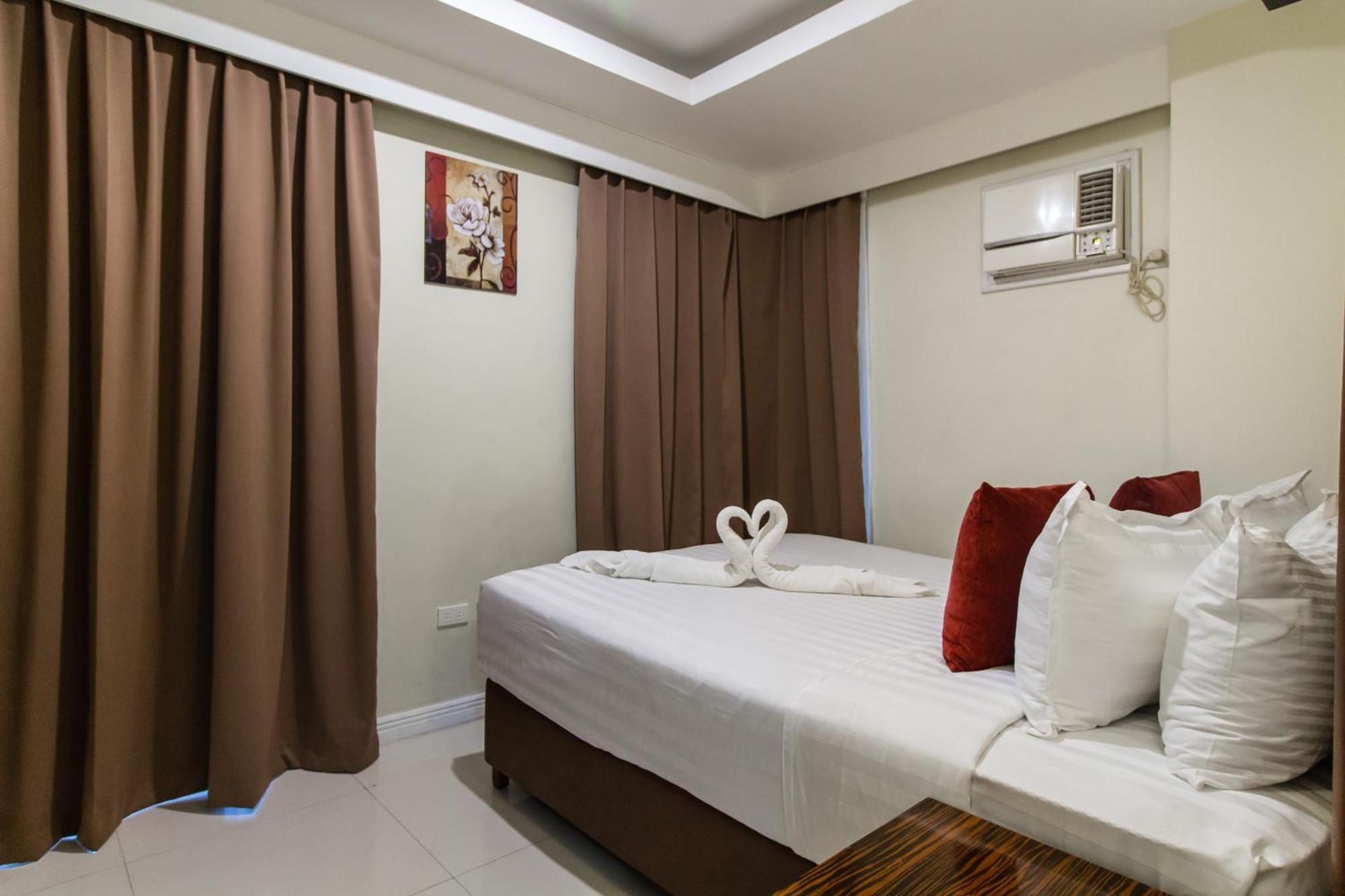 Jmm Apartment Suites Манила Экстерьер фото
