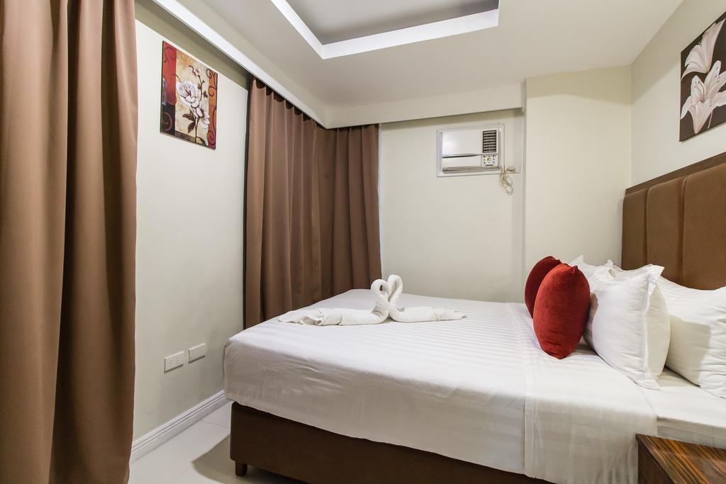 Jmm Apartment Suites Манила Экстерьер фото
