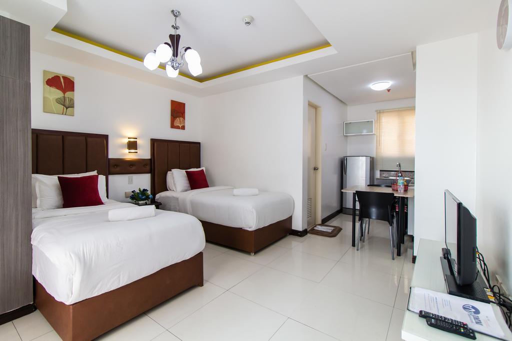 Jmm Apartment Suites Манила Экстерьер фото