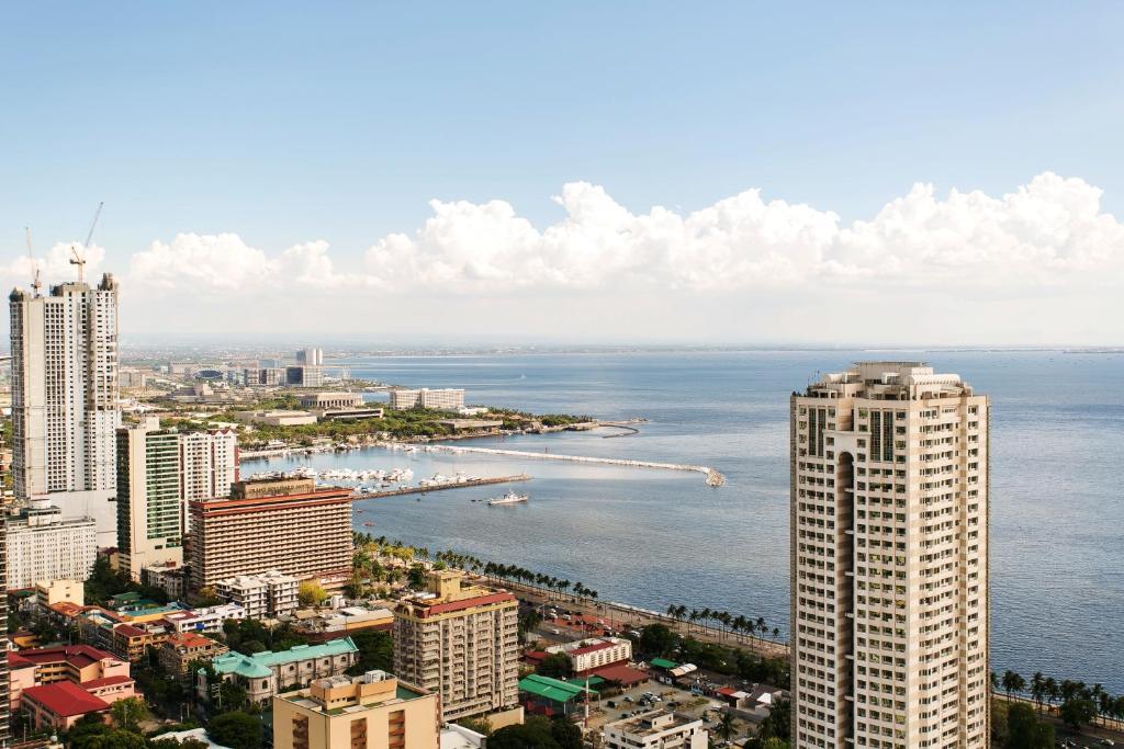 Jmm Apartment Suites Манила Номер фото